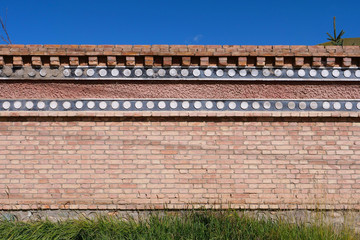 Retro brick wall in Tibetan Buddhist monastery Arou Da Temple in Qinghai China.