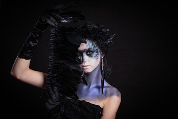 Halloween photo shoot Day of the dead on a black background with in the studio.