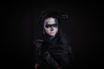 Halloween photo shoot Day of the dead on a black background with in the studio.