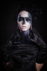 Halloween photo shoot Day of the dead on a black background with in the studio.