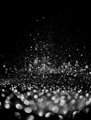 glitter lights grunge black and white background for graphic design resources.