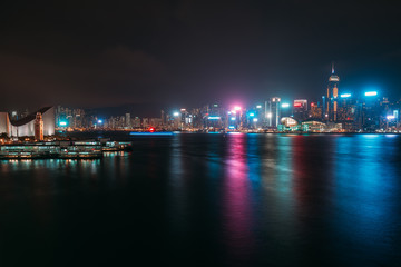 Fototapeta na wymiar Hong Kong cityscape at night. View From Victoria Harbour