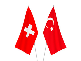 National fabric flags of Switzerland and Turkey isolated on white background. 3d rendering illustration.