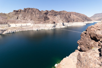 Decreasing water leves at Hoover Dam lake Mead. April 2019, Las Vegas Nevada. calm waters blue sky