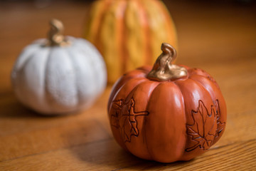 Fall pumpkins on old wooden background. Autumn background