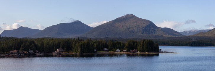 Beautiful Aerial Panoramic View of homes on the Ocean Coast during a sunny morning. Taken in Ketchikan, Alaska, United States.