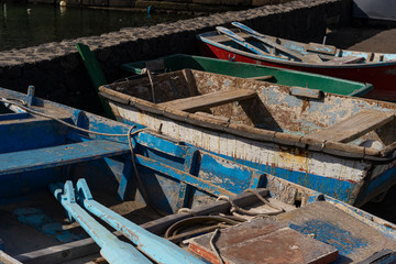 Old wooden fishing boats in a small harbor on the Canary islands - 295574702