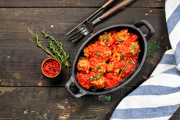 Meatballs with rise in tomato sauce