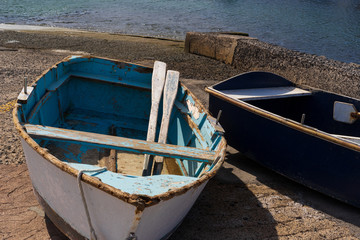 Old wooden fishing boats in a small harbor on the Canary islands - 295574743