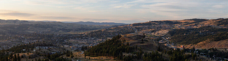 Beautiful Aerial Panoramic View of a Canadian City, Kamloops, during a colorful summer sunrise. Located in the Interior British Columbia, Canada.