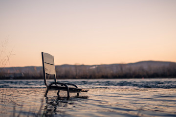 empty chair in the water. drowned man concept.