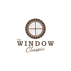 Classic circle window logo with rough brick frame - for classic style home construction business and other purposes