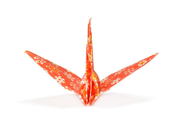 Front view of orange color traditional Japanese origami crane