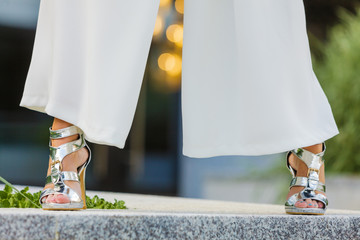 Woman wearing high heels and culottes