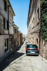 Typical italian old street  Italian houses.