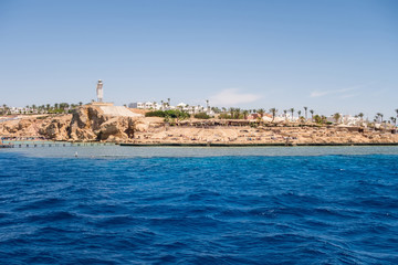 Fototapeta na wymiar Lighthouse Red sea Sinai mountains panoramic landscape in Egypt