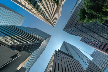 Foto op Plexiglas Tokyo Cityscape. Low angle view of skyscraper buildings scenery. Marunouchi district, Tokyo, Japan © Askanioff