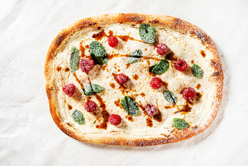 sweet pizza with raspberries and caramel