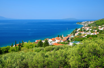 Fototapeta na wymiar View of village Brist located on the coast of Adriatic sea, Makarska riviera in southern Dalmatia, Croatia, Europe.