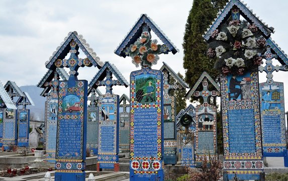 Merry Cemetery in Sapanta, Maramures County - Romania. Mar.12.2016. The cemetery is famous for the crosses of brightly colored tombs and naive paintings representing scenes from the lives of strangers