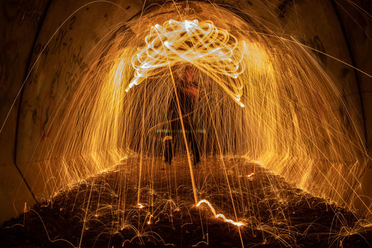 burning steel wool light painting, long exposure.