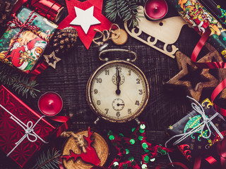Vintage old watch and Christmas decorations. View from above, close-up, flat lay. Congratulations to loved ones, family, relatives, friends and colleagues