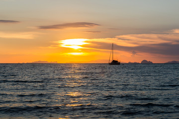 Fototapeta na wymiar Yacht at anchor at sunset