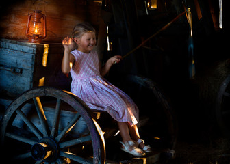 a little girl frolicking and flashing headlights in the fall