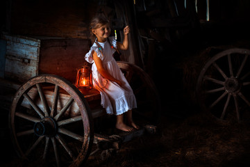 a little girl frolicking and flashing headlights in the fall