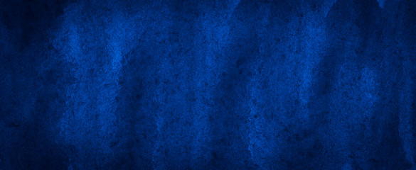 Saturated dark blue watercolor with unique uneven paint stains. Abstract indigo background for design, layouts and templates.