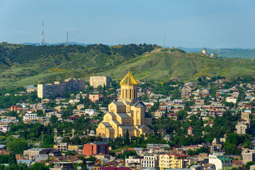 Fototapeta na wymiar View of the Holy Trinity Cathedral Tsminda Sameba in Tbilisi