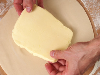Place butter in the centre of the dough. Making Puff Pastry Series.