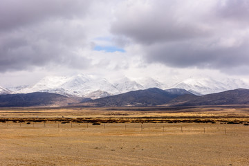 View from the Tibetan plateau to the Himalayan mountains. Tibet. China