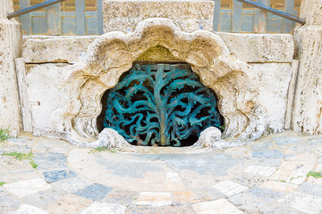 Close up of the central water drain in Piazza del Campo, Siena, Italy