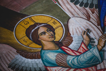 Obraz na płótnie Canvas Street view of Sibiu, Holy Trinity Cathedral fresco close up