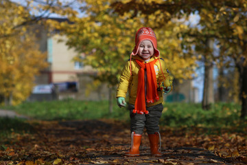 A young kids in a park walk