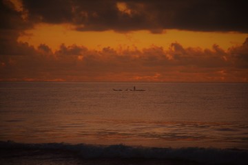 Fishermen Boats on a calm cloudy dawn