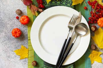 Autumn rustic table. Thanksgiving or autumn harvest table setting on stone or slate table. Top view of a flat lay.