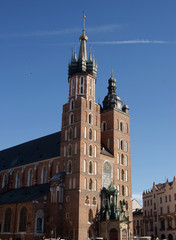 Fototapeta na wymiar two high towers of St.Mary's Church in Krakow's center