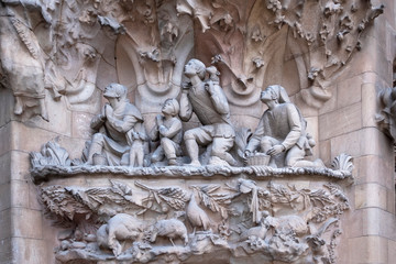 Fototapeta na wymiar Barcelona, the sculptures of the facade of La Sagrada Familia Cathedral in catalonia