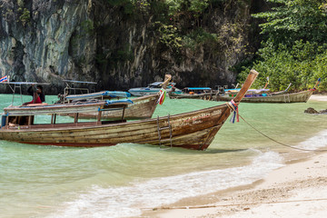 Fototapeta na wymiar Traditional Longboats in Thailand for Tourist Excursions