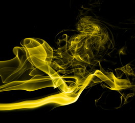 Yellow smoke on black background