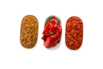 Vegetarian dip baked pepper, zucchini and tomato paste isolated on white background