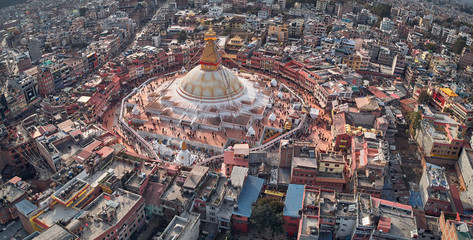 Panoramic Aerial view on streets of Kathmandu and a stupa of Boudhanath is created in the form of a...