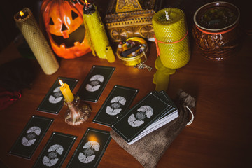  Mystical atmosphere, view of tarot card on the table, esoteric concept, fortune telling and predictions. 