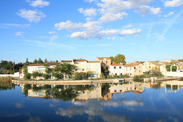 Lighthouse and old fishing port of Grau du roi in Camargue, a resort on the coast of Occitanie region in France