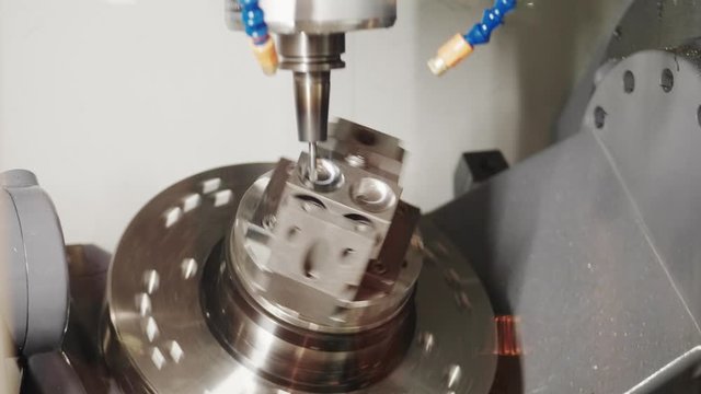 Lathe tool with computer numerical control, Y-axis electric module milling detail, few shots. CNC lathes in turn-mill multi-tasking machine drilling material diameter by rotate. Deep hole boring part