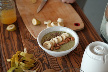 green smoothie bowl of spinach and almonds. vegan 