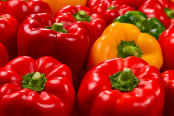 Fresh red, green, yellow bell pepper background.