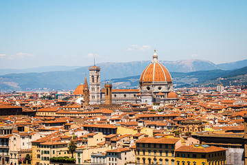 Skyline view of the city of Florence on a bright summer day in Italy with the Santa Maria Novella in the middle.